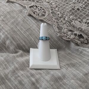 Elegant Black Ring With Blue Stones